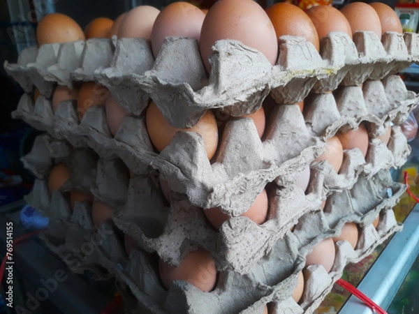 Obraz collection of many chicken eggs in an egg tray at home grocery store