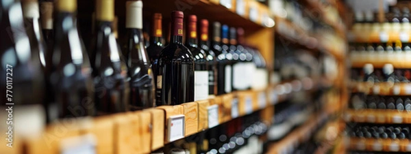 Obraz Wine bottles on wooden shelf in wine store, diminishing perspective.