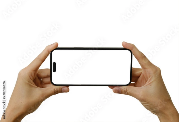 Fototapeta Two hands holding the smartphone mockup in a vertical posture with a clear screen including clipping path and modern frameless design for advertisement.