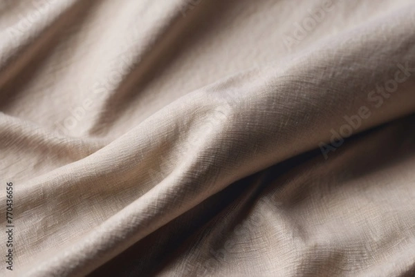 Fototapeta A photograph showcasing the intricate weave and natural texture of a beige fabric with nuanced tones