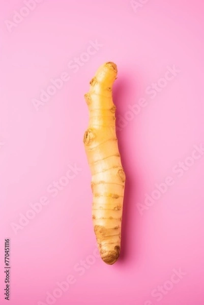 Obraz galangal on pink background. close up view.