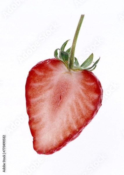 Fototapeta Sliced strawberry on white background