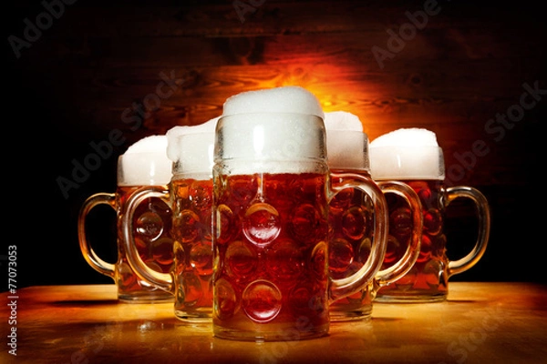 Fototapeta Five Beer Glasses on the Wooden Table