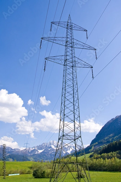Fototapeta electrical powerlines with a blue sky