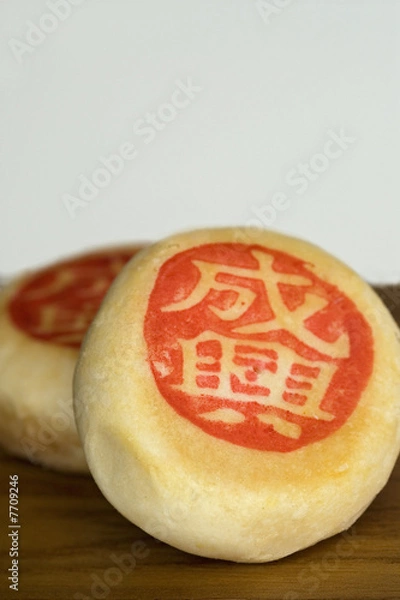 Fototapeta Close up of traditional Chinese pastries with Chinese characters
