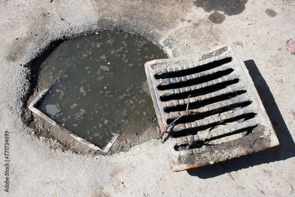 Fototapeta Problem with water drainage, clogged manhole