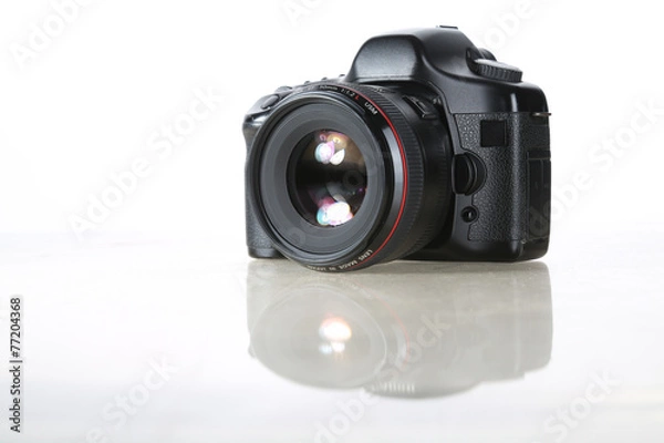 Obraz The camera on white background