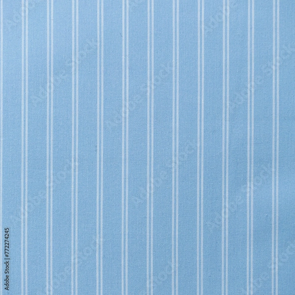 Fototapeta Blue striped fabric as background texture close up. Vertical stripes pattern