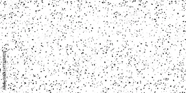 Fototapeta Speckled gritty noise grain pattern overlay. Rough distress grunge black paper gradient. Speckle grit white dust vintage grainy background. Old retro wall spray graphic texture vector illustration
