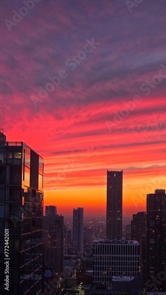 Fototapeta sunset over the city