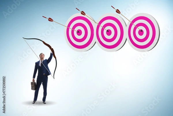 Fototapeta Businessman in objective setting concept