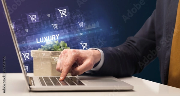 Fototapeta Businessman working on laptop