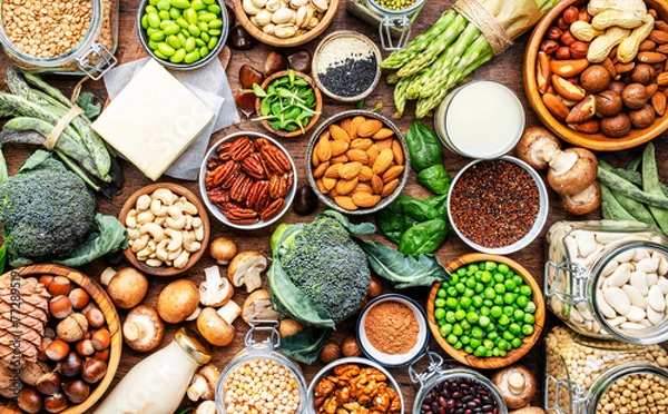 Fototapeta Vegan protein food background. Full set of plant based vegetarian food sources. Healthy eating, diet ingredients: legumes, beans, nuts, soy and almond milk, tofu, quinoa, vegetables, seeds and sprouts