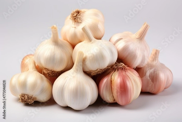 Fototapeta Garlic stack isolated on white background