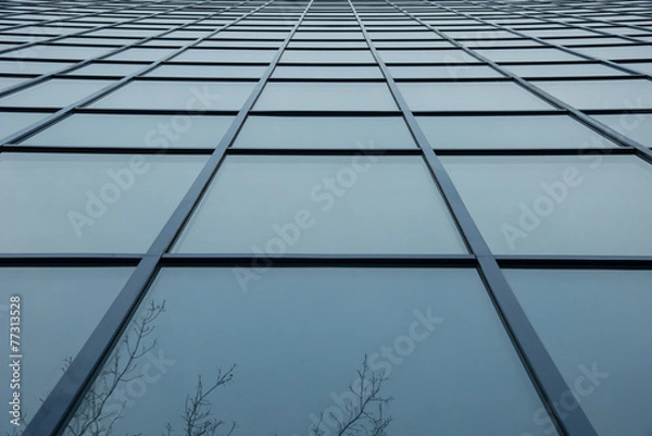 Obraz A wall of square blue glass windows