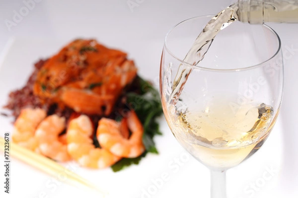 Obraz Pouring white wine and background