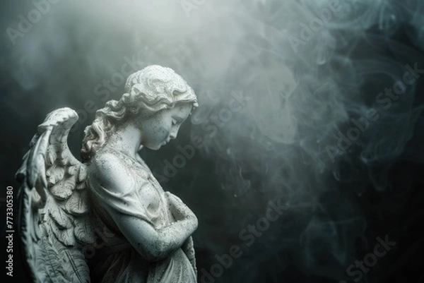 Fototapeta funeral background, beautiful angel sculpture on black background with copy space