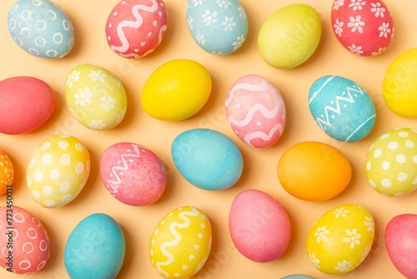 Fototapeta Easter eggs on a bright background. Easter celebration concept. Colorful easter handmade decorated Easter eggs. Place for text. Copy space.