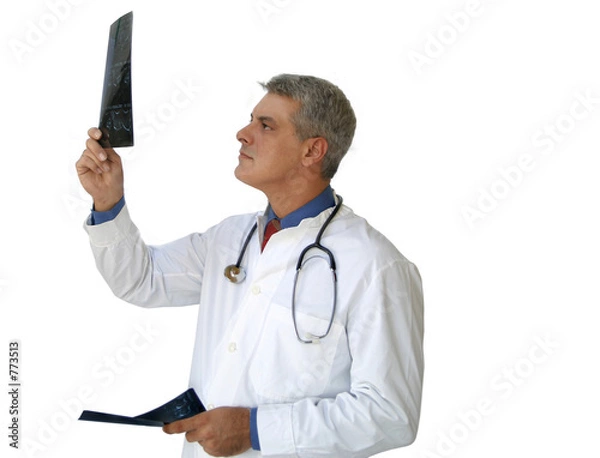 Fototapeta doctor looking at xrays