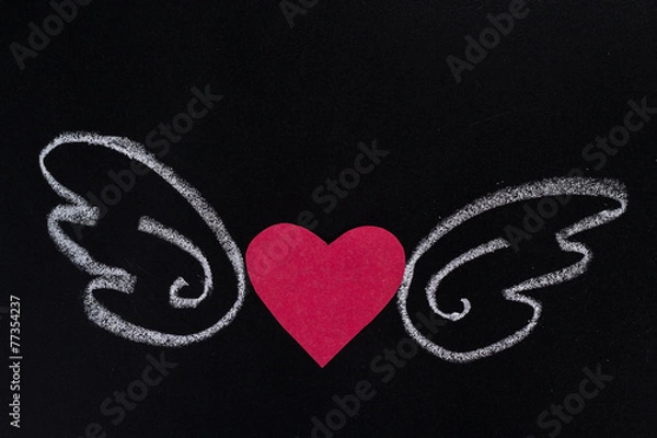 Obraz paper heart with pictured chalk wings on black background