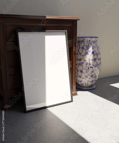Obraz single frame mockup poster standing on the concrete floor in front of the vintage wooden cabinet with vase decoration