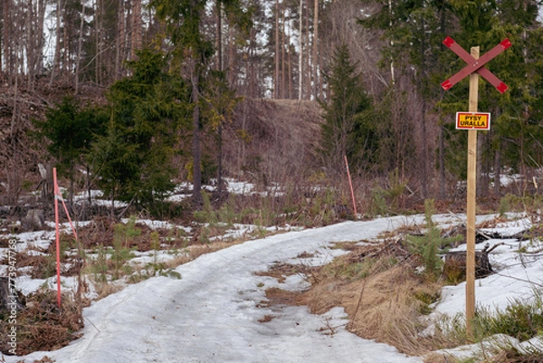 Fototapeta the snow melts in the ski trail