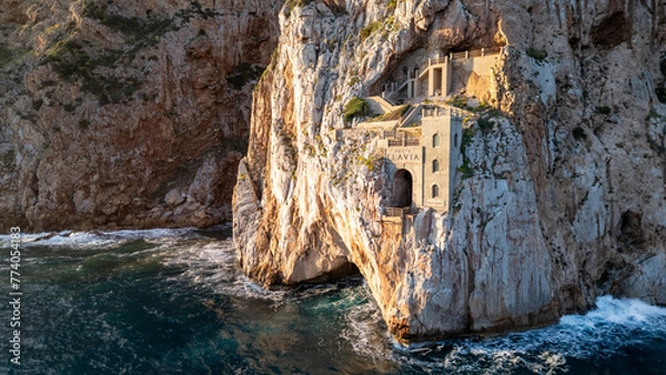 Obraz Rough sea in Sardinia near Porto Flavia. Aerial view of Pan di Zucchero and crystal clear sea