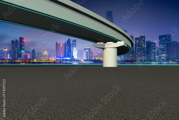 Fototapeta Asphalt empty space road and neon bridge with modern city skyline at night 