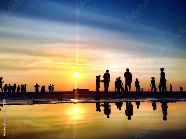 Obraz Sylwetki to zajęcia na plaży o zachodzie słońca