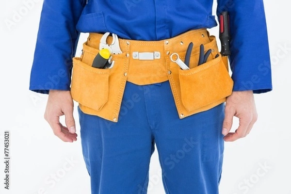 Obraz Repairman wearing tool belt