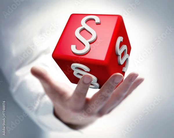 Fototapeta Hand mit Paragraphenwürfel