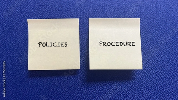 Fototapeta Words Policies And Procedure on sticky note with blue background.