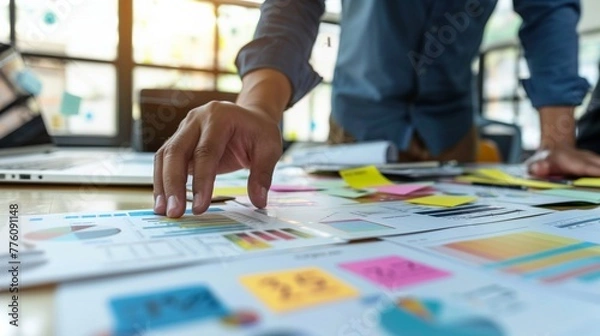 Fototapeta Business Annual Meeting: Close-Up of Businessman's Hand Sharing Ideas and Brainstorming for New Project Launch
