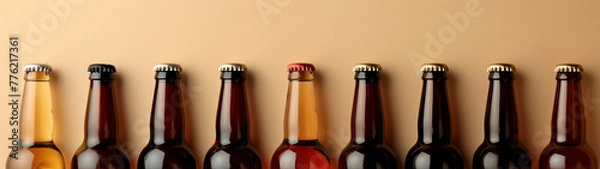 Fototapeta Beer bottles on a beige background, design for a drinks menu or an advertisement in a pub, created with generative AI technology 