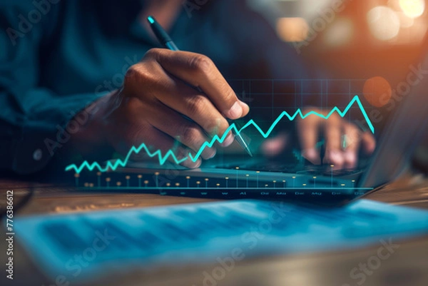 Fototapeta Analyzing Financial Growth Trends on Digital Tablet