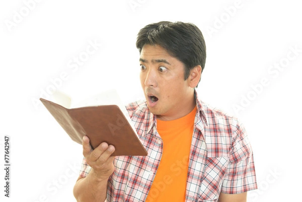 Fototapeta 驚いた表情の男性