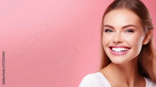 Obraz Universal photorealistic banner with a girl smiling with beautiful white teeth, close-up on a pink plain background, close-up with space to insert text