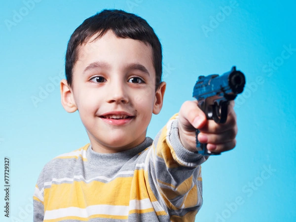 Obraz Boy and plastic gun