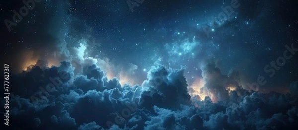 Fototapeta A vast night sky filled with thick clouds and twinkling stars, creating a dramatic and mysterious atmosphere.
