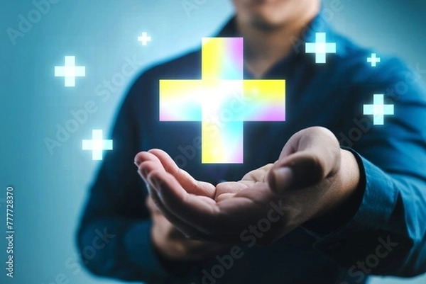 Fototapeta A man is holding a cross with a hand and surrounded by many stars. Concept of hope and positivity, as the man is holding the symbol of faith and the stars represent the infinite possibilities
