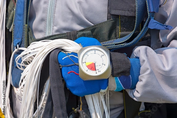 Obraz Skydiver hand in glove close-up.