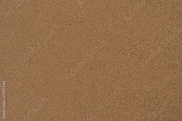 Fototapeta Texture of wet sand on a beach top view