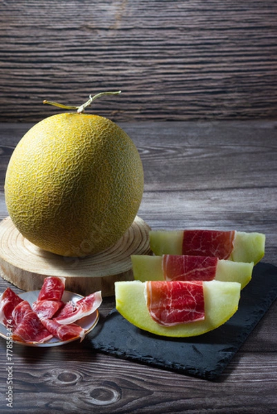 Obraz Refreshing mouthfuls: Melon and Iberian ham.