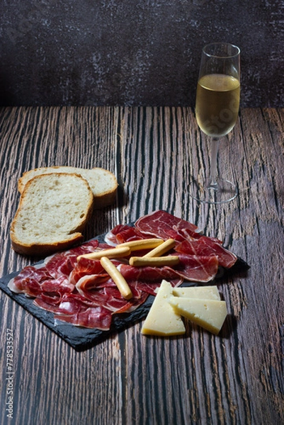 Obraz Spanish gastronomy in its purest form: Iberian ham and old cured sheep cheese.
