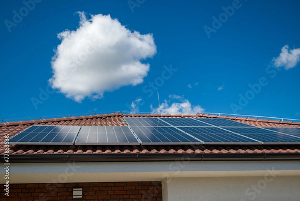 Obraz Harvesting Sunshine: Residential Solar Panels Generating Electricity on a Sunny Day