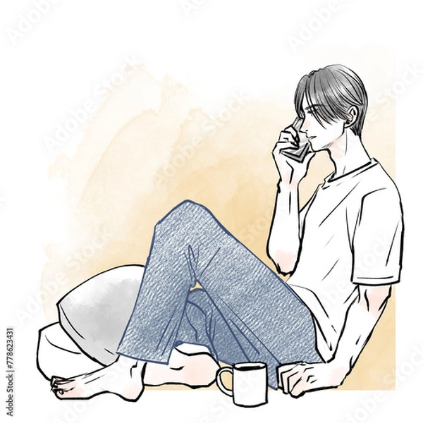 Obraz 床に座ってスマホで話している男性