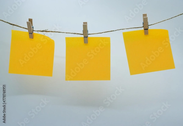 Obraz post-it notes hanging on rope