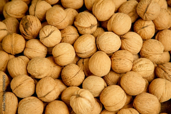 Obraz Fresh walnuts at a market stall