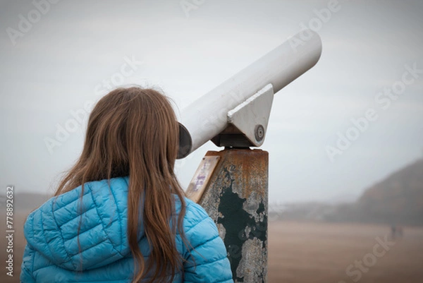 Obraz child looking through telescope