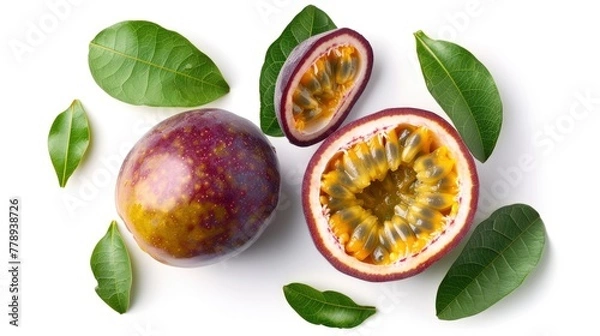 Fototapeta Kohana passion fruit cut in half, showing the vibrant yellow and purple center with deep red patterns, set against a white background, captured from an overhead perspective